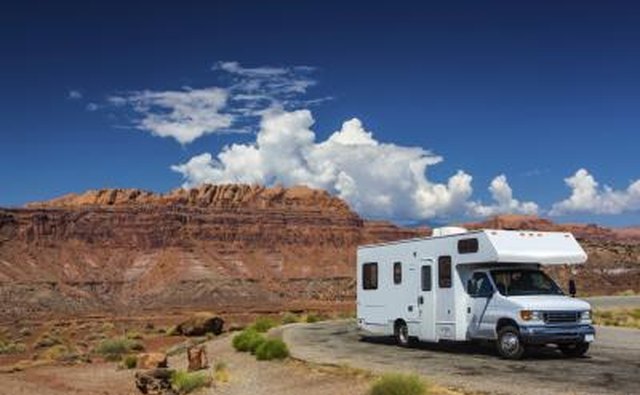 A Class C motorhome is bigger than a Class B and has an overhead sleeping area.