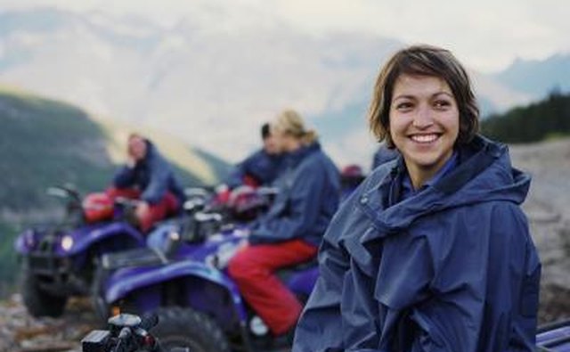 Friends on ATV trail in mountains