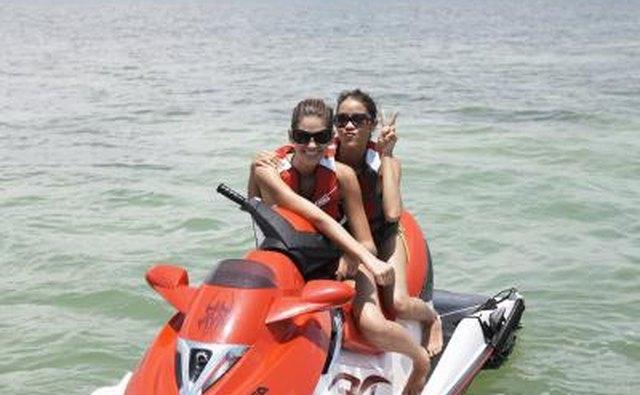 girl friends on jet ski in Tampa Bay