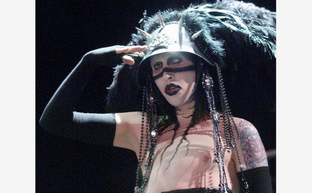 Marilyn Manson brought his signature dark style to a 2001 Ozzfest performance.