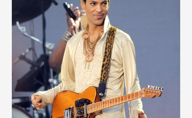 Prince brought his characteristic swagger to the Hop Farm, a U.K. music festival.