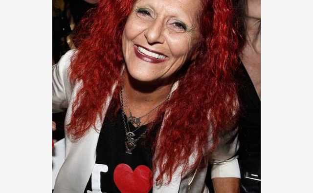 Patricia Field is also known for her bright red hair.