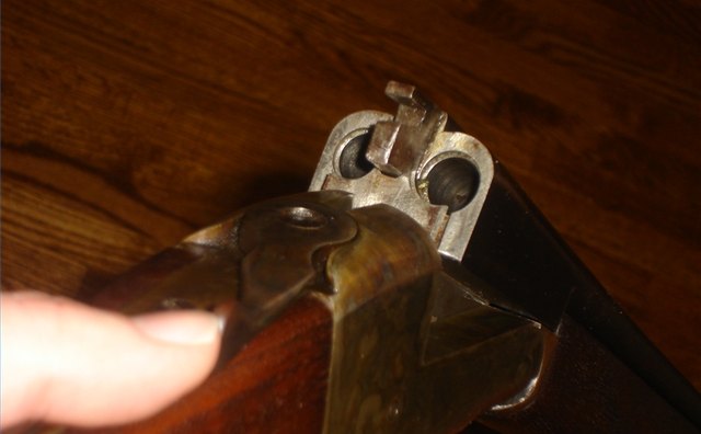 Shotgun with open breach, demonstrating that it is unloaded