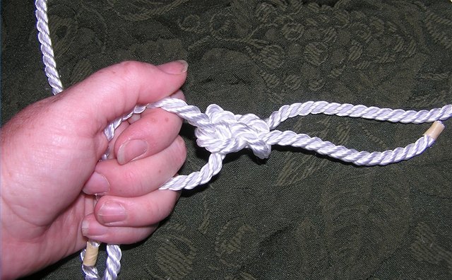 Left hand rope held in left hand