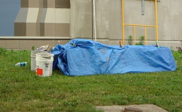 Protect flooring with a heavy drop cloth, blanket or tarp.