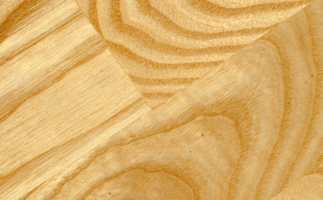 Examine wood subfloor for damage.