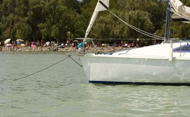 Anchor line in the water holding boat