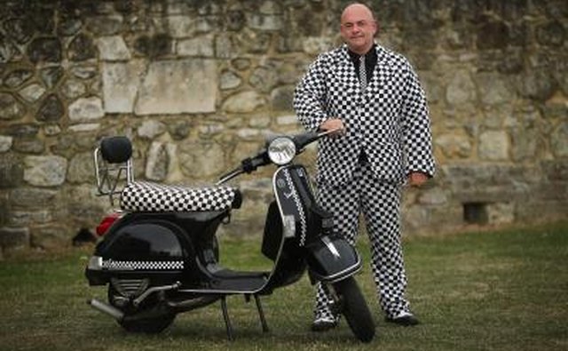 Man with Vespa PX 200