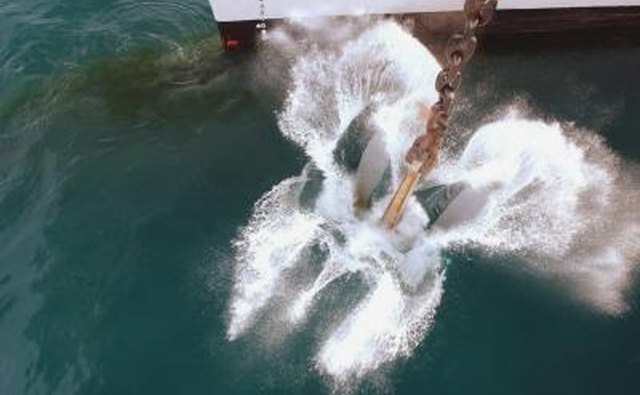 Ship dropping anchor