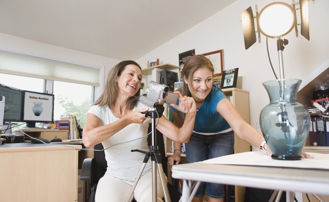 Mother and daughter taking a picture for online auction