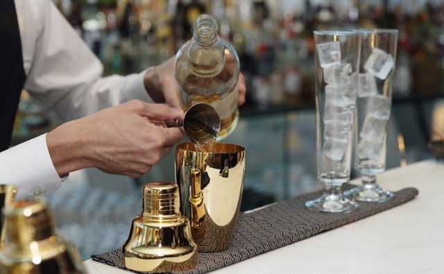 Bartender is making a cocktail