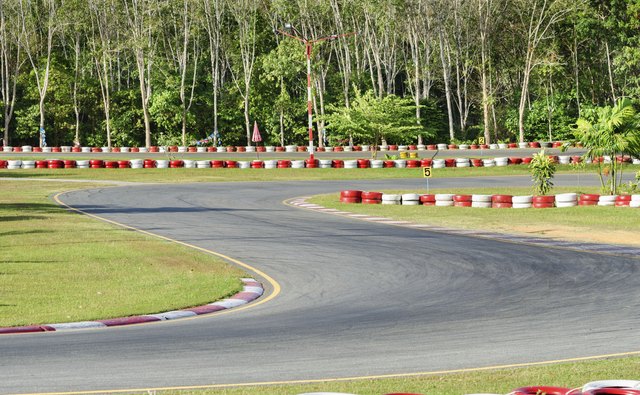 Turn on a empty race car circuit.
