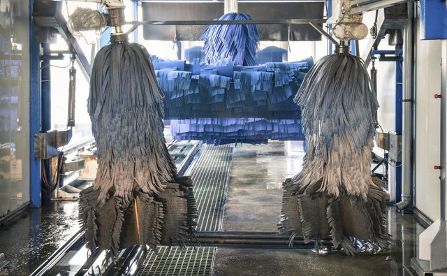 Modern automatic Carwash with blue Brushes