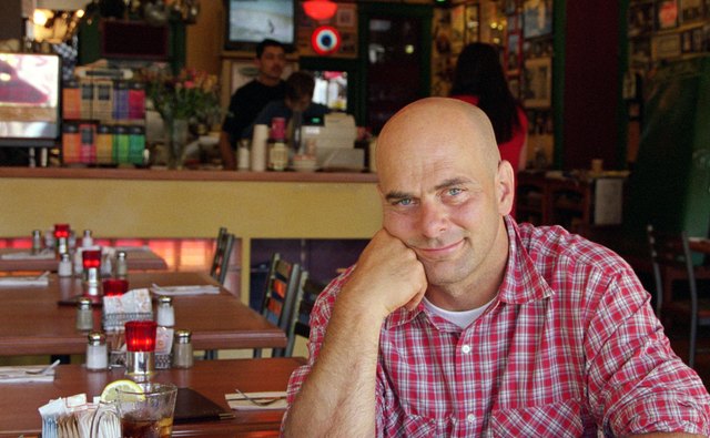 Man in a neighborhood cafe
