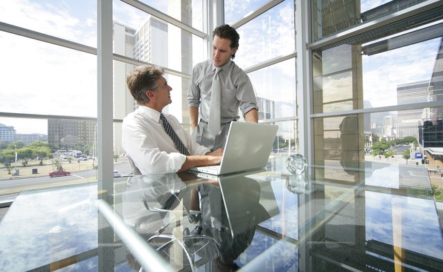 Businessmen using a laptop