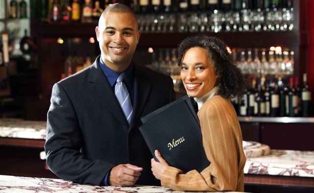Host and hostess in restaurant bar