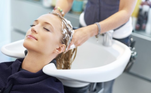 Letting experienced hands treat her tresses