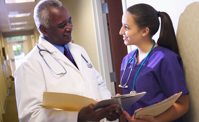Doctor and nurse with file