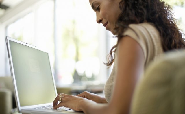 Woman Using Laptop