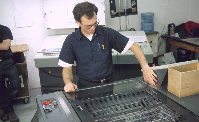 Man repairing machinery