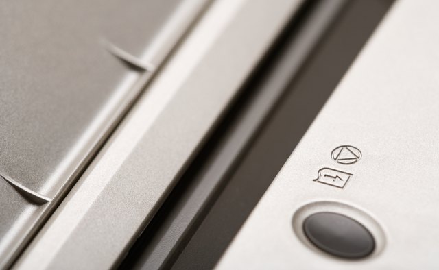 Close-up of feed button on computer printer