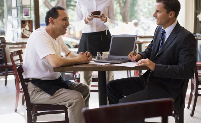 Restaurant Owner Meeting with Accountant