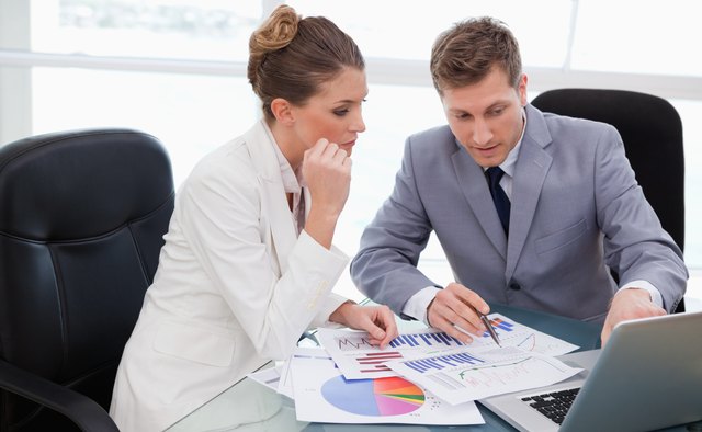 Business team analyzing market research