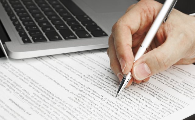 Signing Contract with Laptop