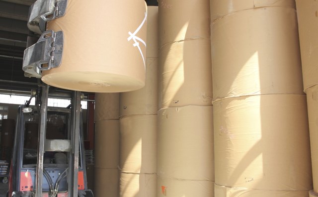 Lifting spools of paper