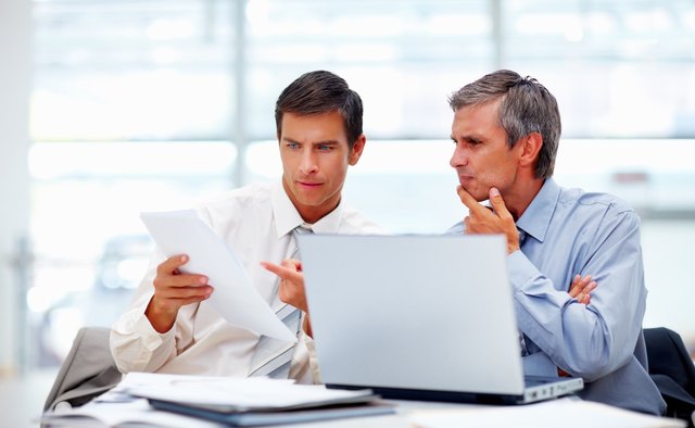 Business colleagues discussing on a project