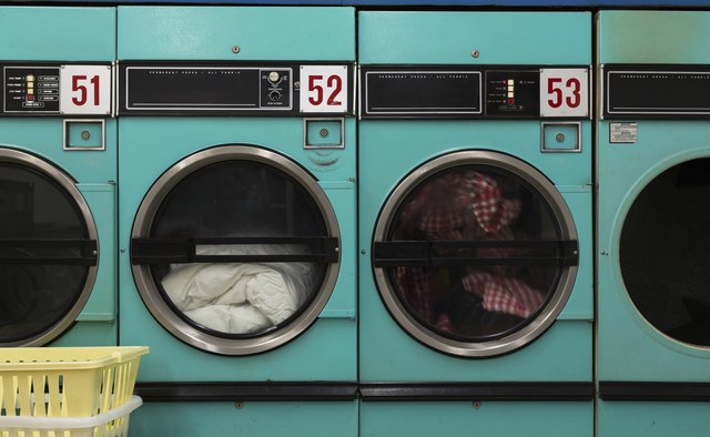 Row of Clothes Dryers - Laundromat
