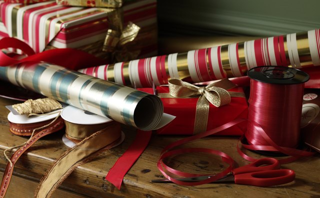 Pile of Christmas wrapping, ribbon and tape
