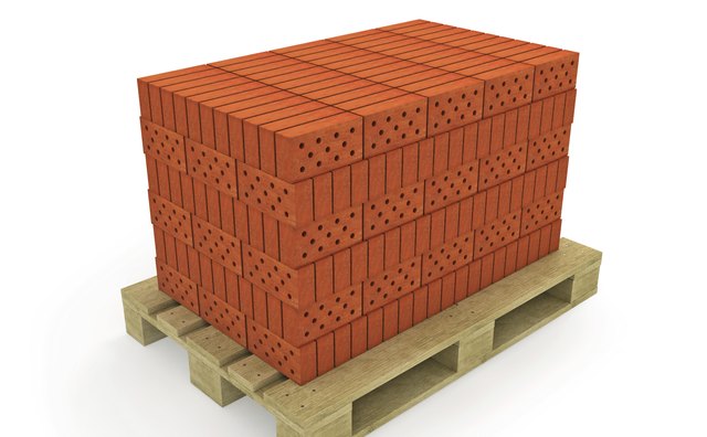 Stack of orange bricks on pallet