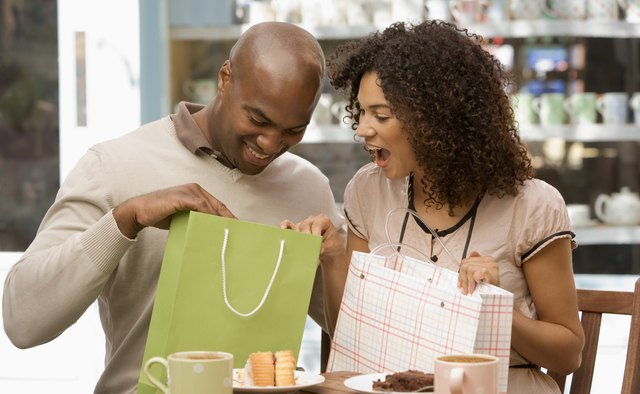 Couple looking in shopping bags