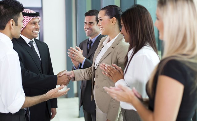 young translator introducing arab businessman