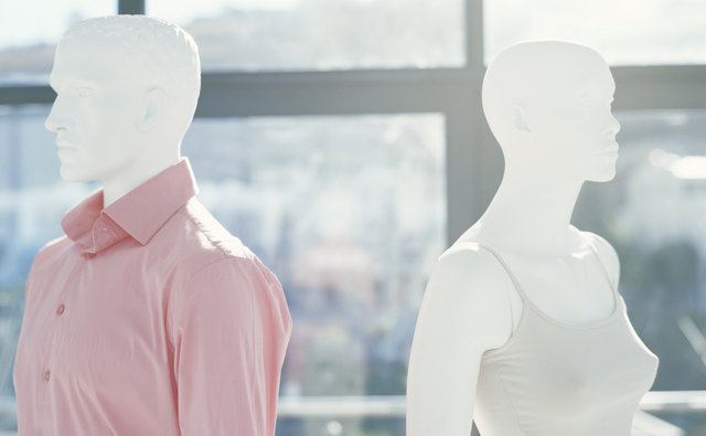 Two mannequins in clothes shop