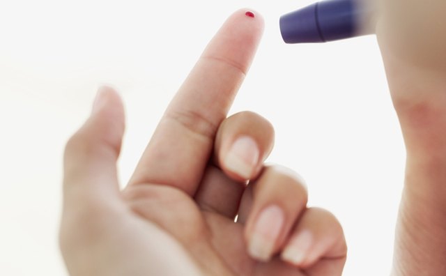 woman giving a blood sample