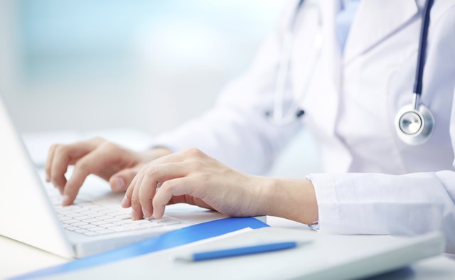 Medical person typing