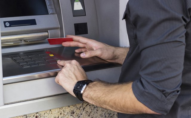 Businessman holding a credit card