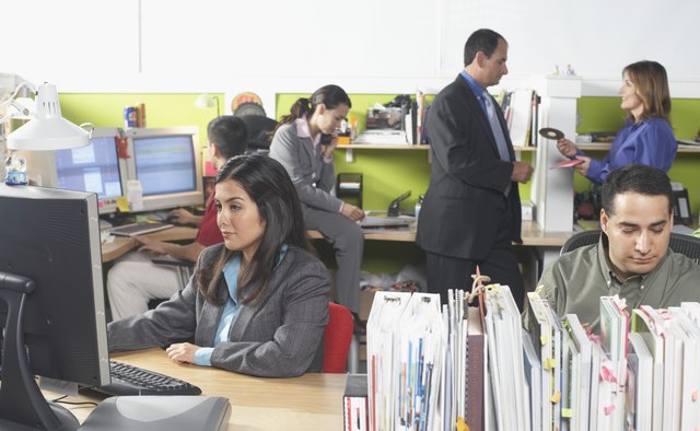 Five business executives in an office