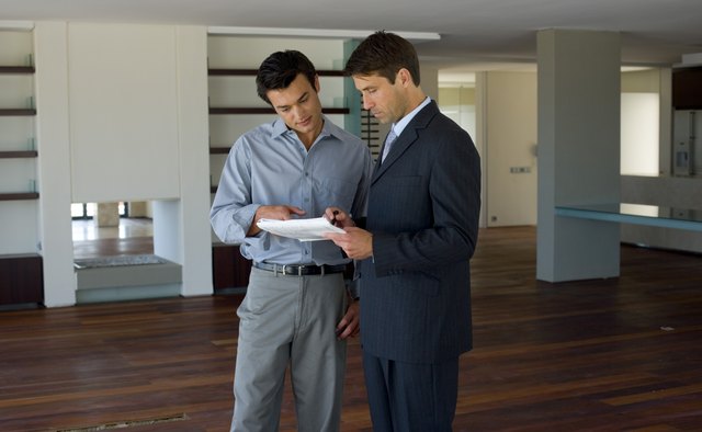 Men with paperwork