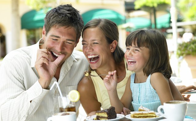 Family eating at an outdoor cafe