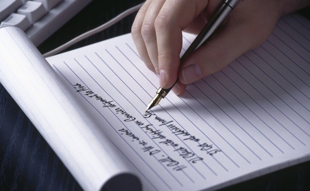 Hand writing on notepad