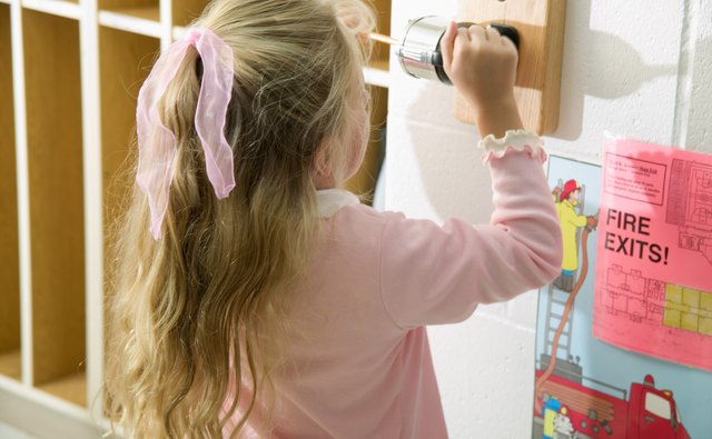 Student sharpening pencil