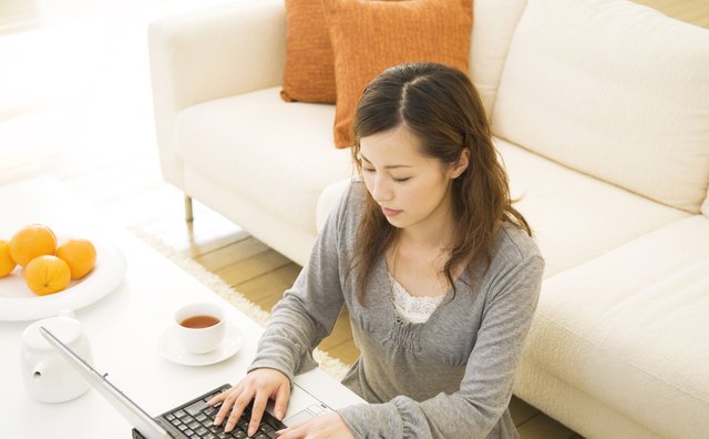 Woman using her laptop