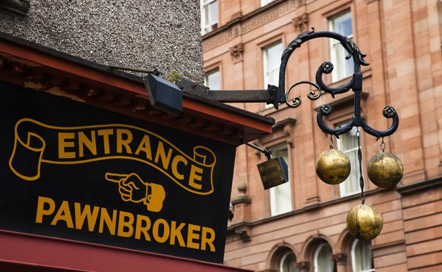 Pawnbroker sign and three metal bals