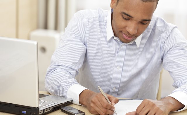 Young african-american businessman working