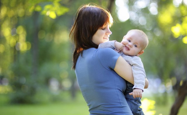 Young woman with her little baby boy
