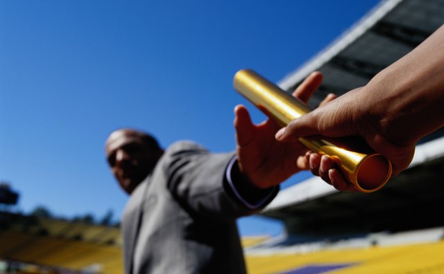 Close-up of a Baton Hand Off
