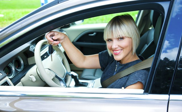 woman driver with car key